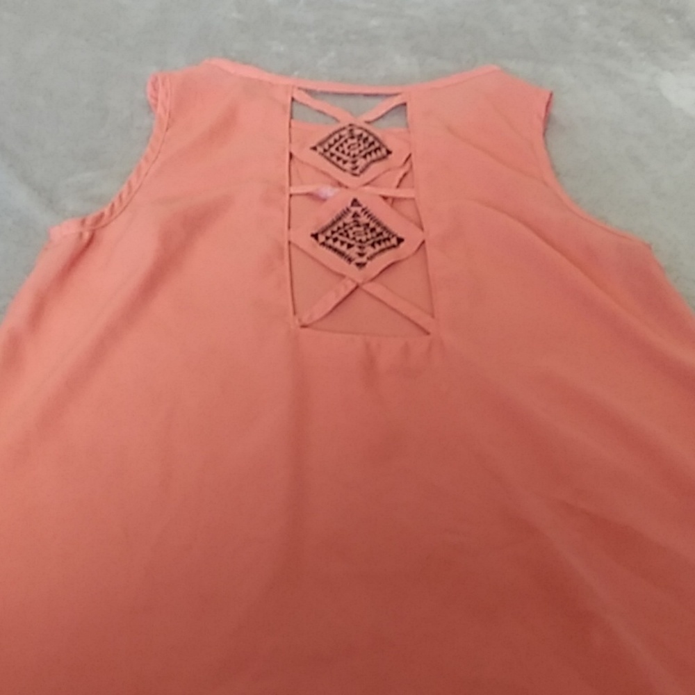 Orange sleeveless top